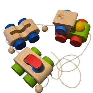 Vibrant Wooden Pull Toy Train Set with Red, Blue, and Green Colors
